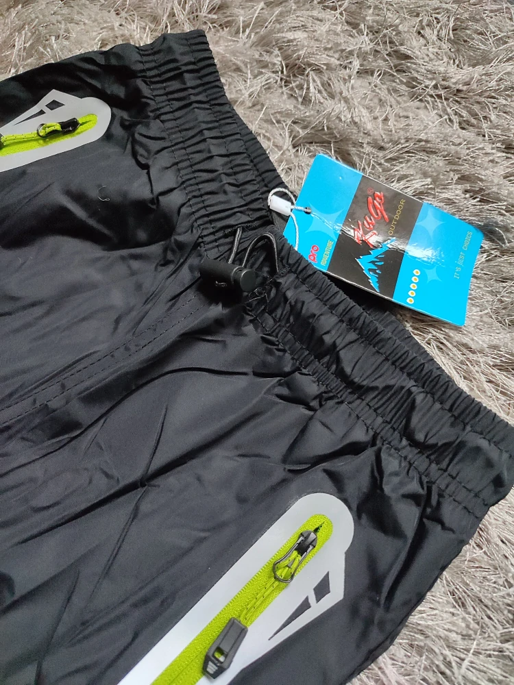 Chlapecké šusťákové kalhoty KUGO zateplené (134-146)