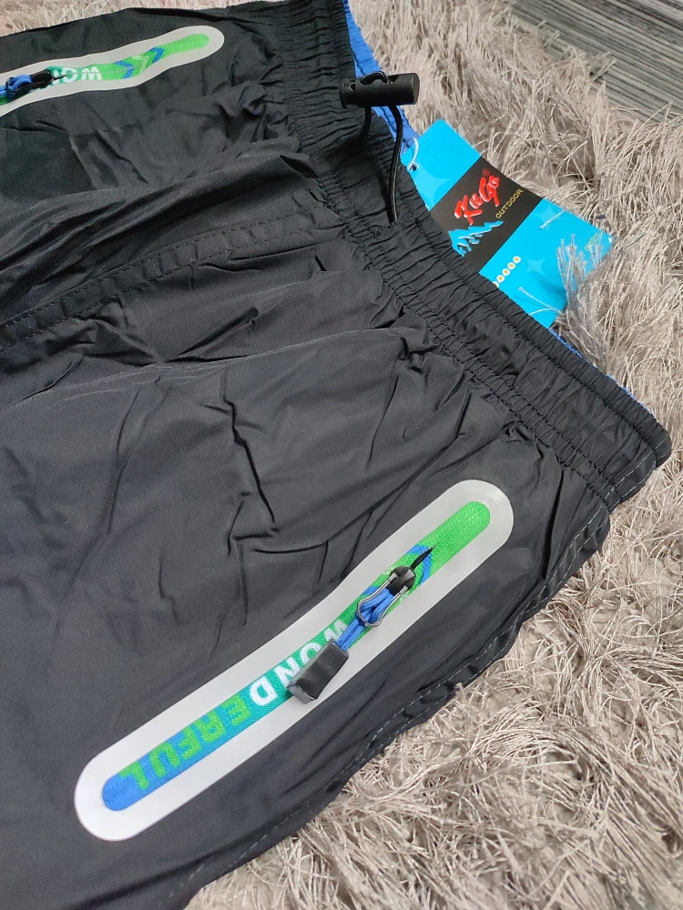 Chlapecké šusťákové kalhoty KUGO zateplené (164)