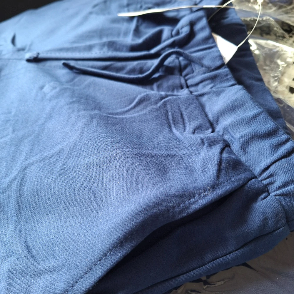 Bavlněné kraťasy ASSASSIN'S CREED dorost/pánské